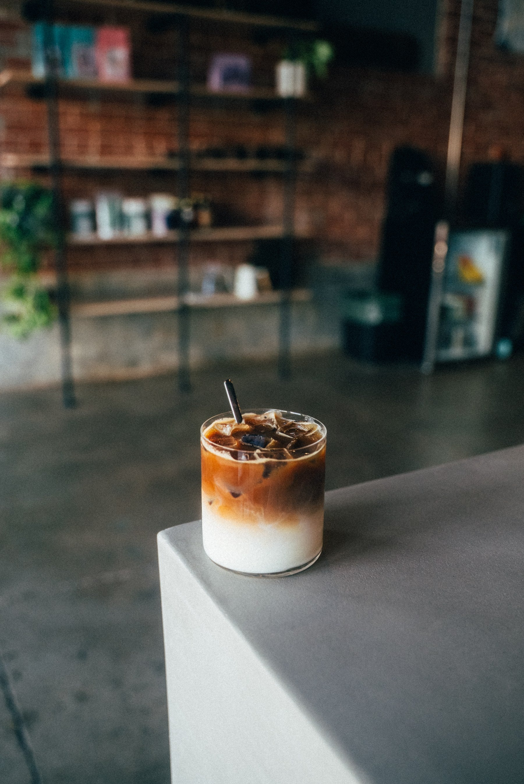 Iced latte, espresso layered over milk