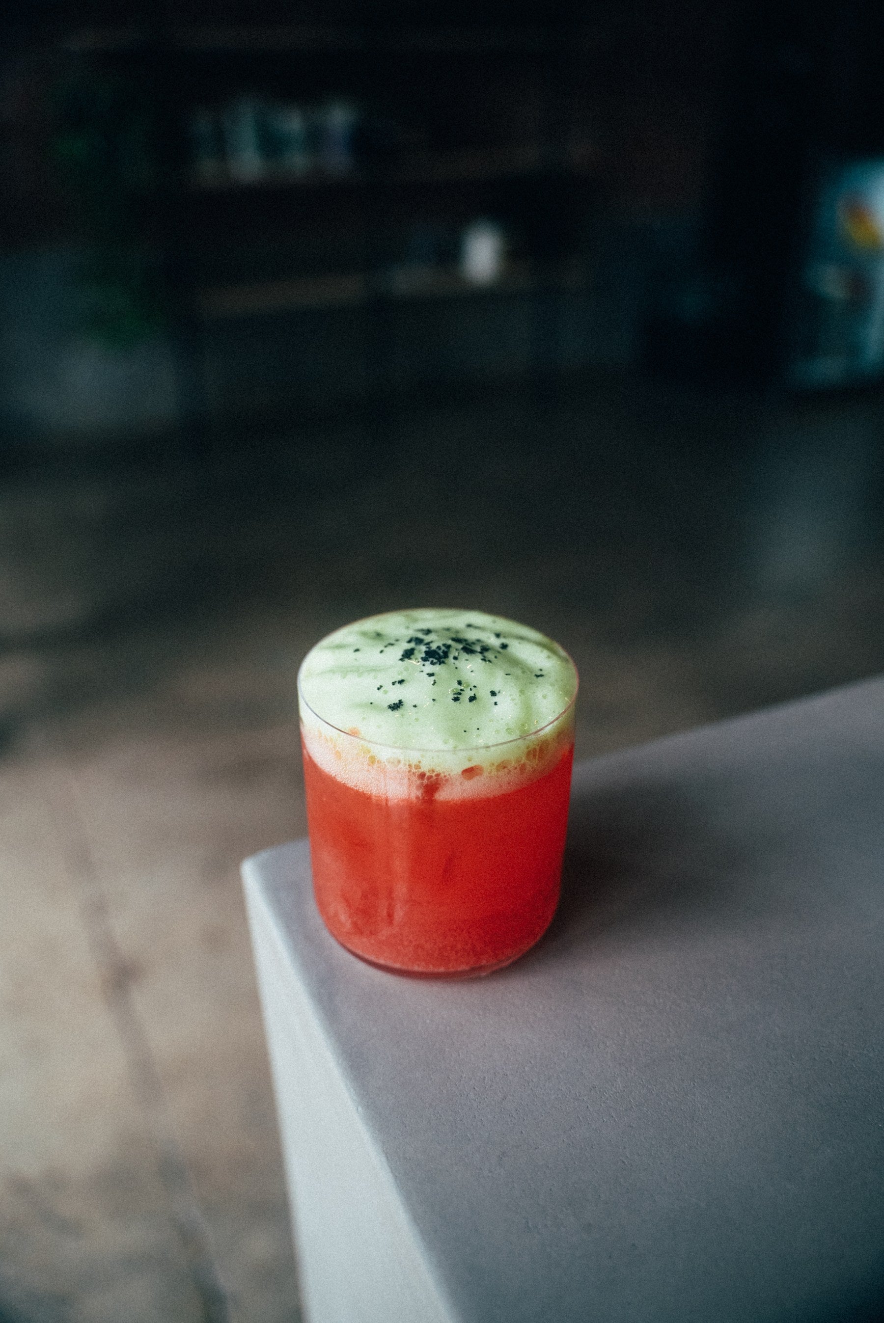 Watermelon fizz with green foam